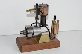 Vertical live steam engine like Stuart BB high speed engine.