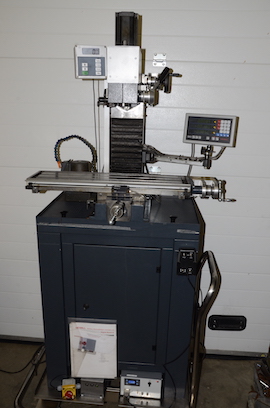 main Wabeco F1210 vertical milling machine with Newall DRO and power table feed for sale