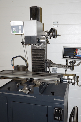 close Wabeco F1210 vertical milling machine with Newall DRO and power table feed for sale